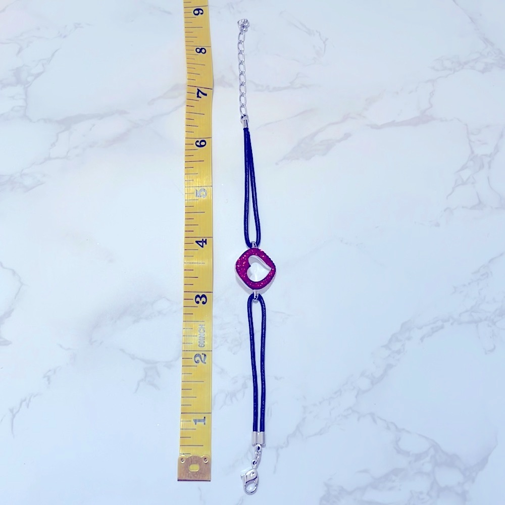 Swarovski red stoned heart bracelet connected with a black band